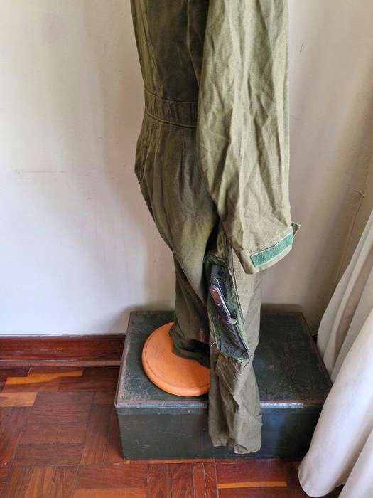 SAAF Flight Suit with survival knife. 46 Cm Armpit to Armpit. Scales one side of knife broken.