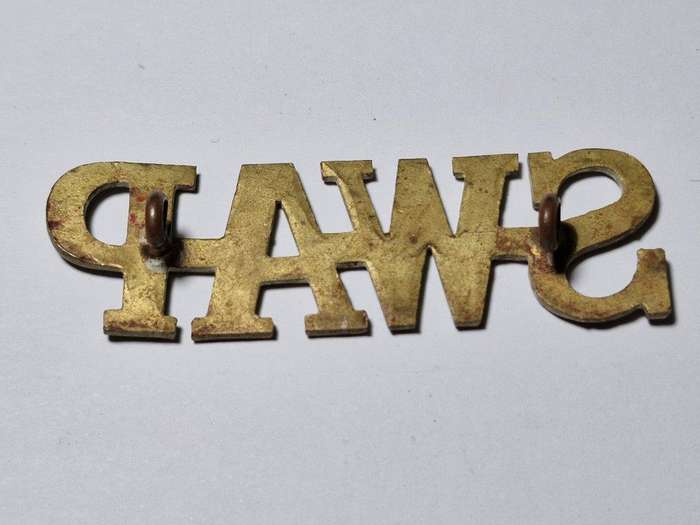Large South West African Police Shoulder Title.