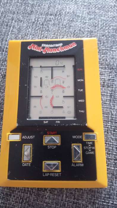 Grandstand mini munchman game