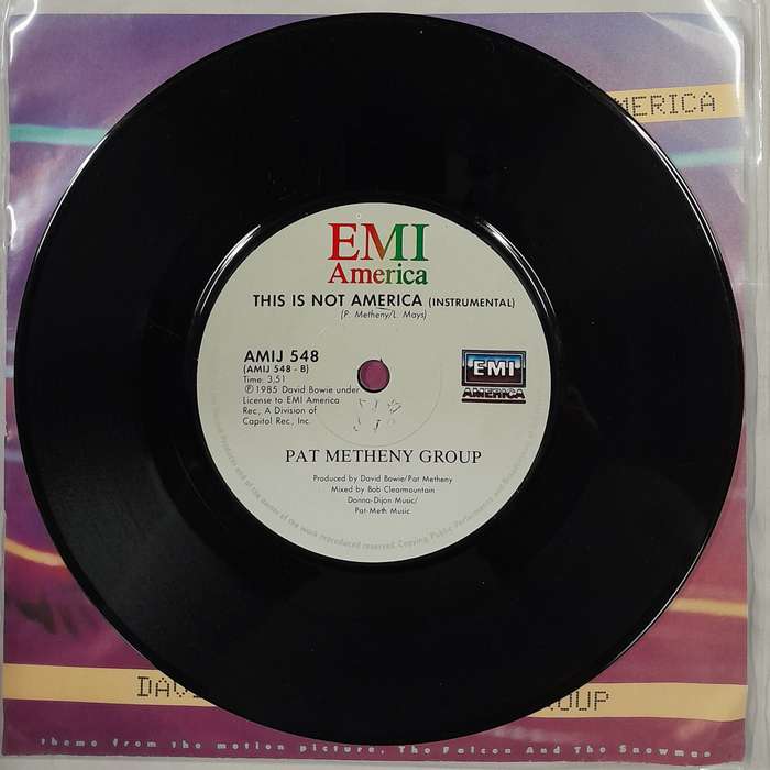 David Bowie / Pat Metheny Group - This Is Not America 7" single (theme The Falcon and the Snowman)