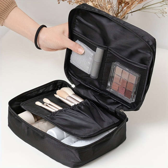 Versatile black canvas cosmetic bag with secure zipper waterproof multi-compartment storage