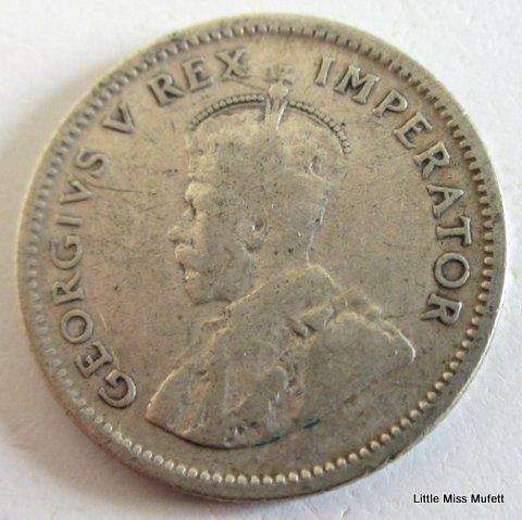 A 1936 South African 6d----CompositionSilver (.800) Weight2.83 g. Low mintage 627,046