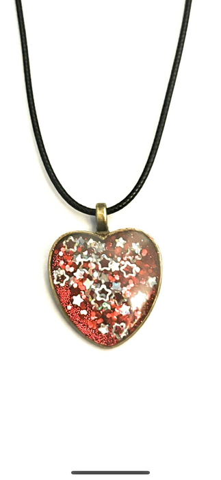 Beautiful resin pendants on a leather necklace