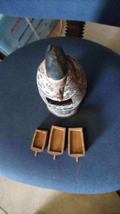 Vintage carved gourd with little trinket drawers on a Coconut shell stand. All natural