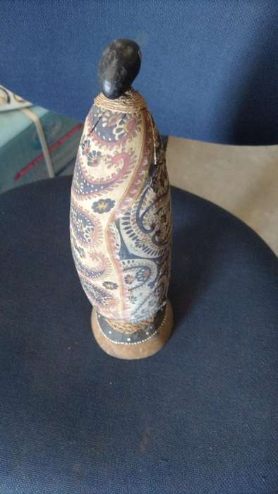 Vintage carved gourd with little trinket drawers on a Coconut shell stand. All natural