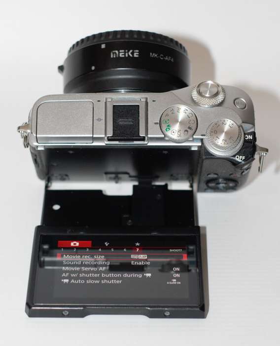 Canon EOS M6 24.2MP WITH Meike MK-C-AF4 EF to M Autofocus Adapter , CHARGER