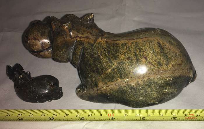 Marble mother and baby hippopotamus