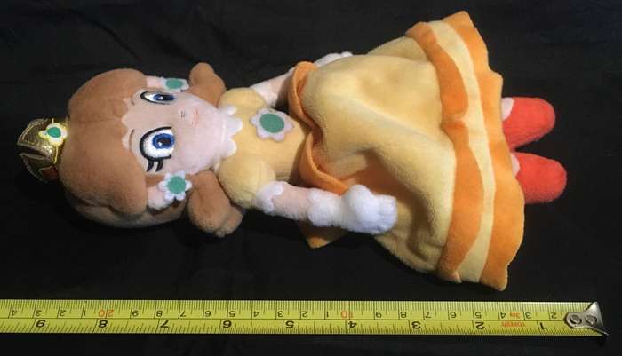 Princess Daisy plush toy from the Super Mario franchise