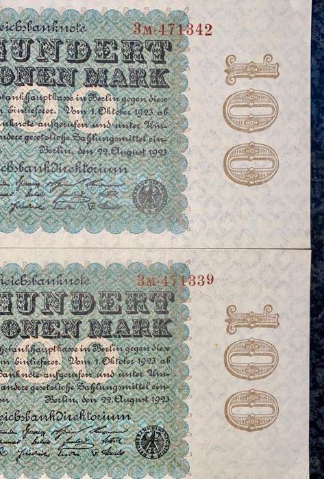 Germany. 100 million mark close sequence 471339 & 471342 AUNC 1923 (1 bid takes all)