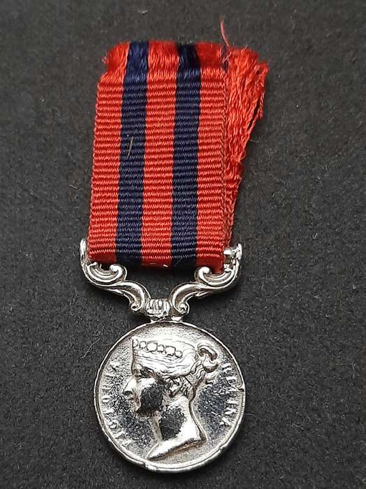 **British Army: Repro. QV 1854 India General Service Miniature Medal w/ Ribbon.**