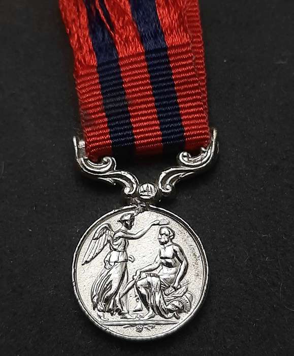 **British Army: Repro. QV 1854 India General Service Miniature Medal w/ Ribbon.**