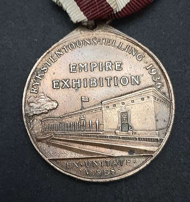 **1936 South Africa : Empire Exhibition Bronze Medallion w/ Silk Ribbon EF. (Pin Intact).**