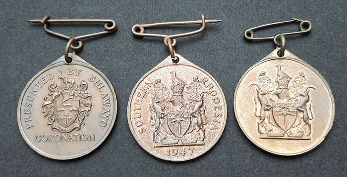 **WW2 & 1953  Coronation: Southern Rhodesia Commemorative Medallions x3 ( VF+).**