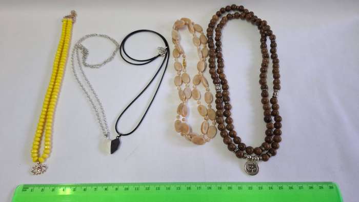 Lot 11A - A Collection of Four Different Style Necklaces