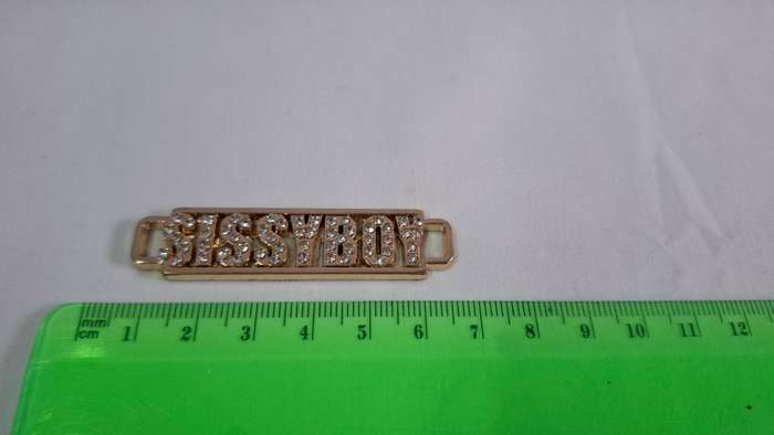 Lot 10B - A Gold Plated Sissyboy Pendant
