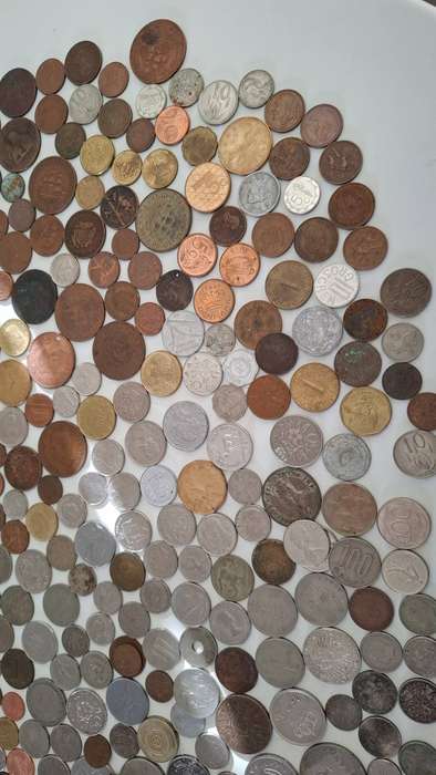 Vintage Tin with a Collection of International  and South Africain Coins Bidding for the Lot