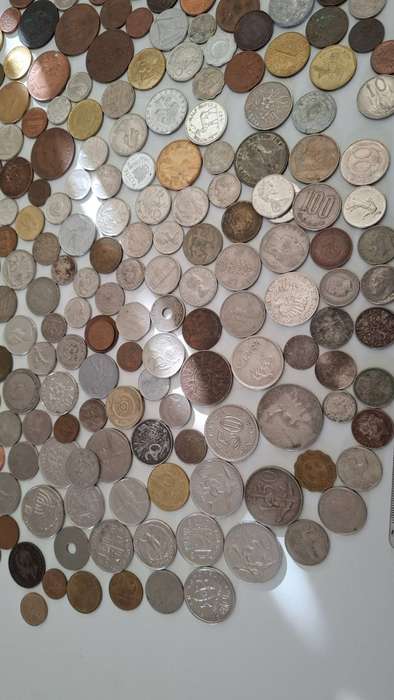 Vintage Tin with a Collection of International  and South Africain Coins Bidding for the Lot