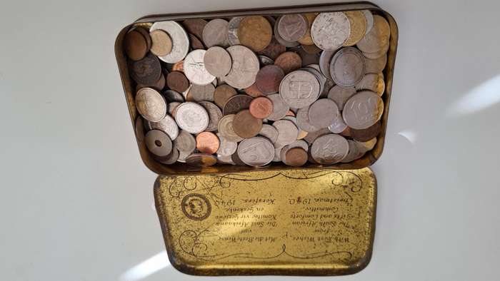 Vintage Tin with a Collection of International  and South Africain Coins Bidding for the Lot