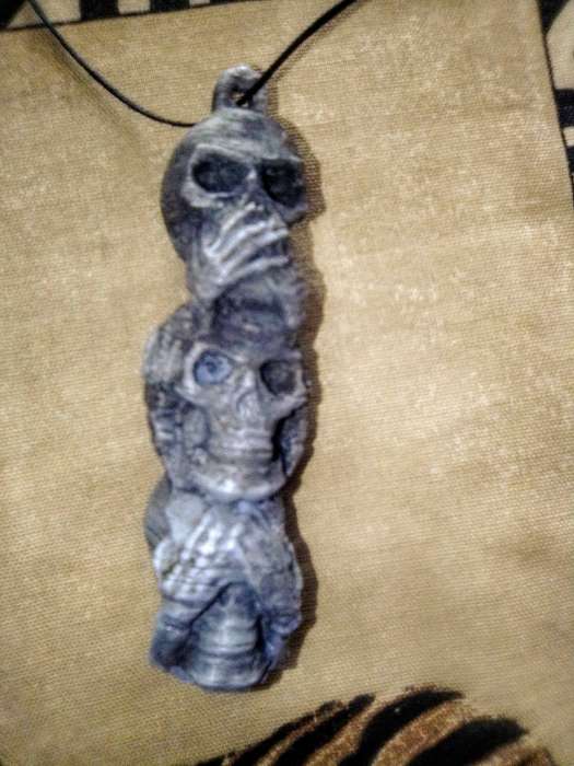 3 evil skull decorative ornament