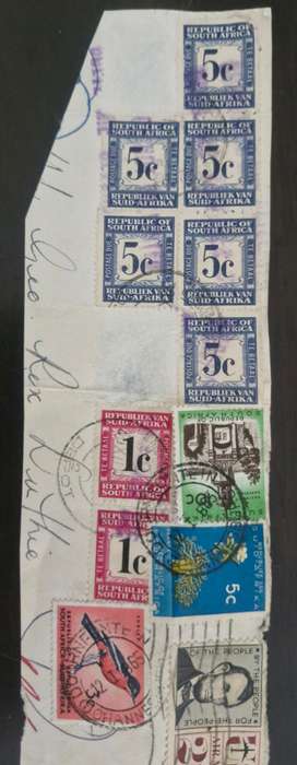 Stamps with 4 different cancellations- USAirmail, South African Postage, & SA postage due stamp
