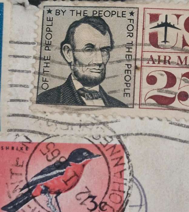 Stamps with 4 different cancellations- USAirmail, South African Postage, & SA postage due stamp