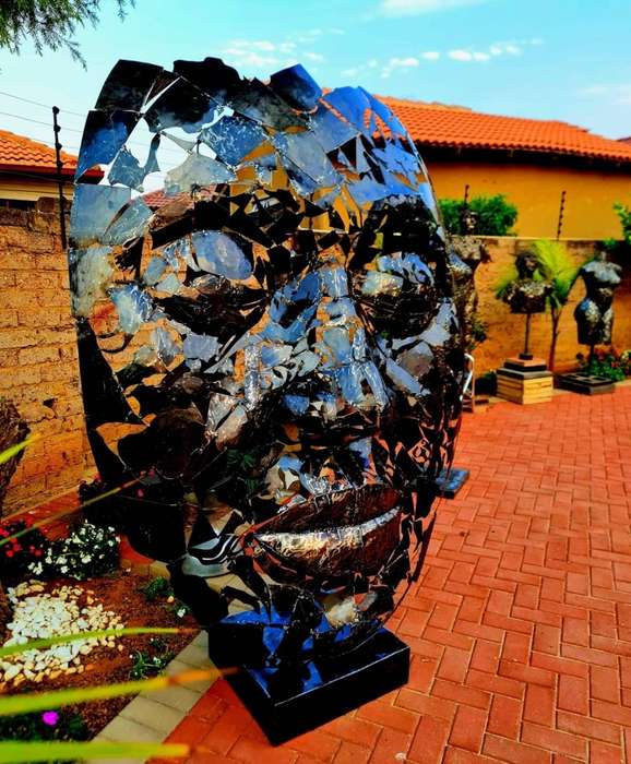 Massive Metal Mask Sculpture