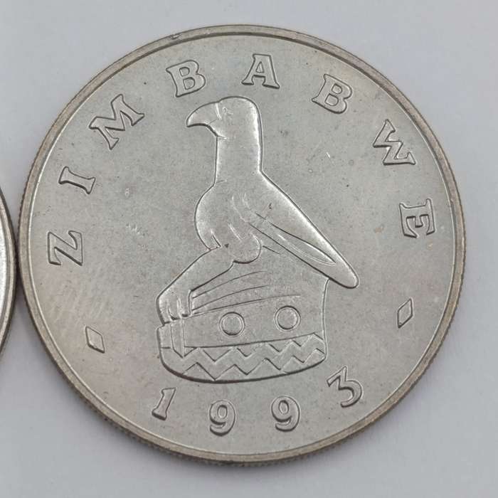 Zimbabwe set of 4 $ coins 1980, 1993, 1997 & 2001
