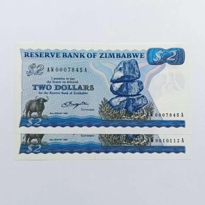 Zimbabwe $2 uncirculated lot of 2 banknotes - replacement notes Pick 1a