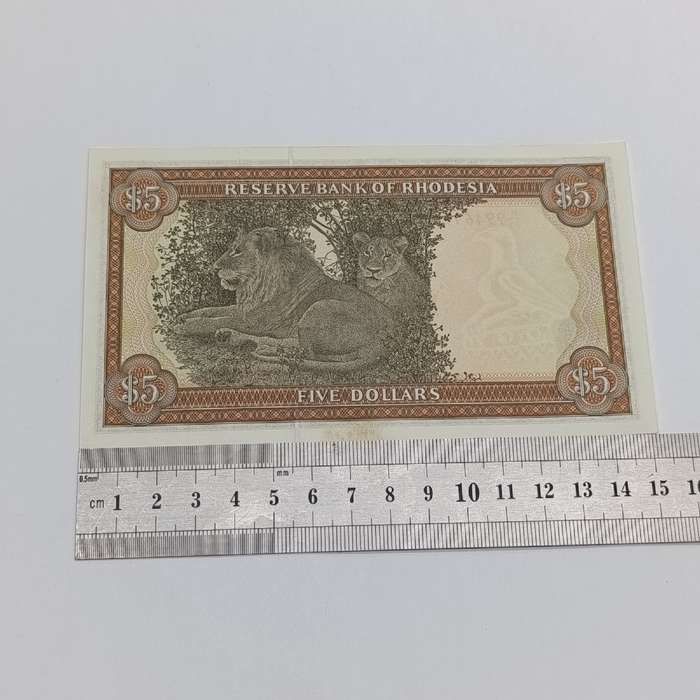 Rhodesia Five dollars banknote 15 May 1979 uncirculated - stain at bottom