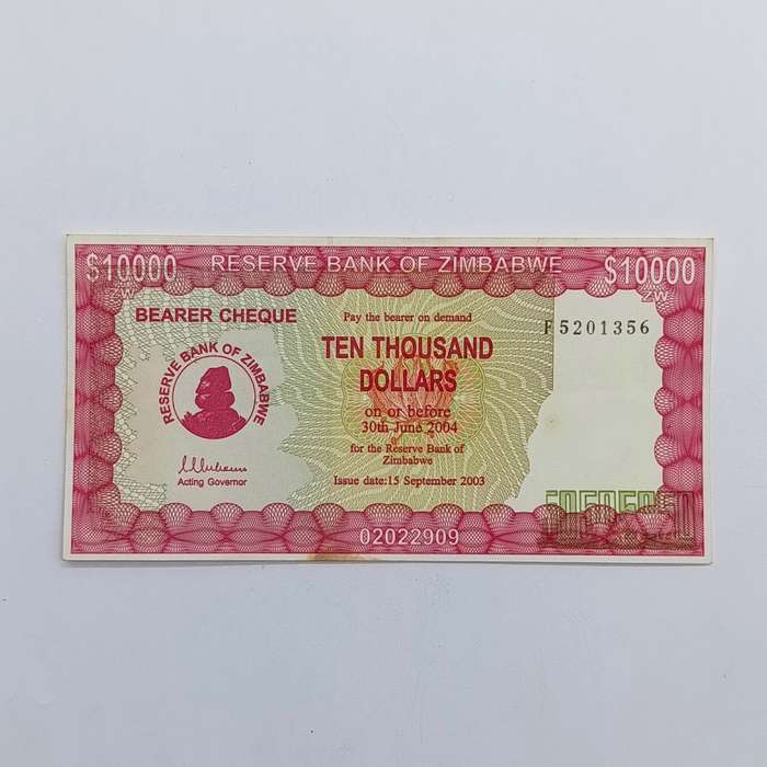 Zimbabwe $10 000 issued 15 September 2003 Bearer cheque - some discoloring but unused