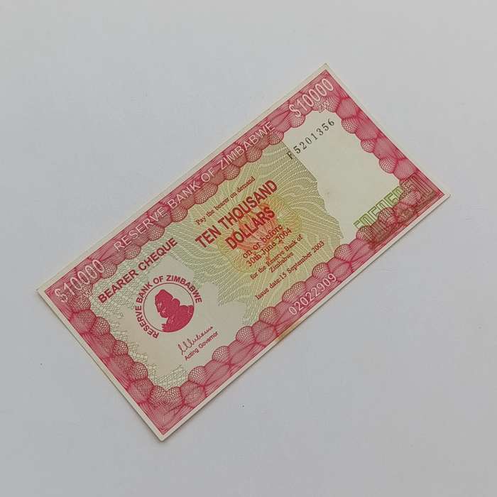 Zimbabwe $10 000 issued 15 September 2003 Bearer cheque - some discoloring but unused
