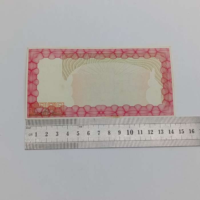 Zimbabwe $10 000 issued 15 September 2003 Bearer cheque - some discoloring but unused
