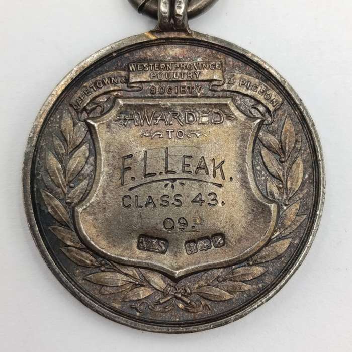 1909 Western Province Poultry medal awarded to FL Leak - Sterling silver