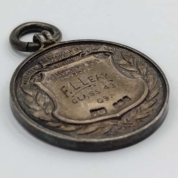 1909 Western Province Poultry medal awarded to FL Leak - Sterling silver