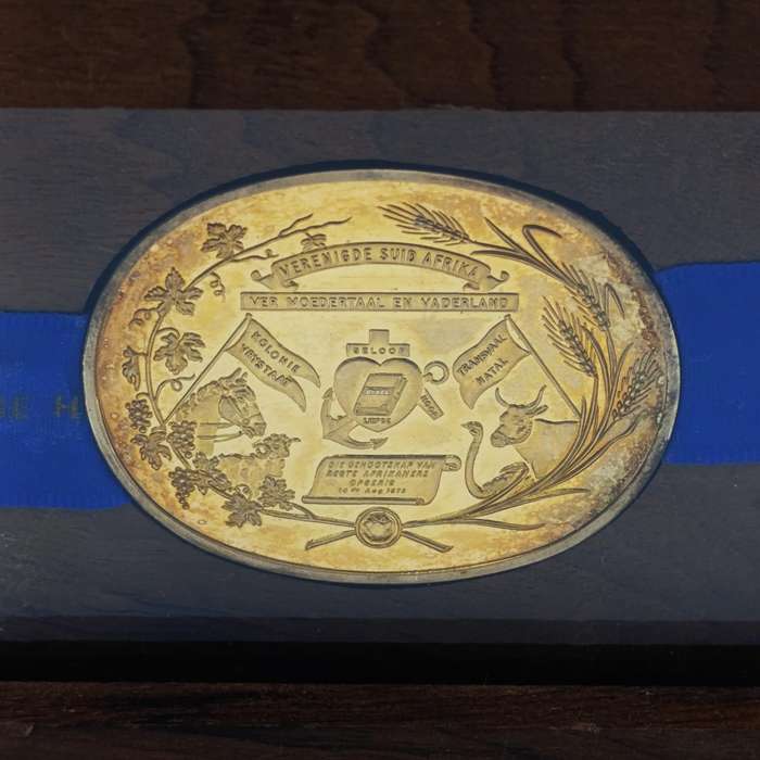 Genootskap van Regte Afrikaners gold plated sterling silver medallion in wooden display case