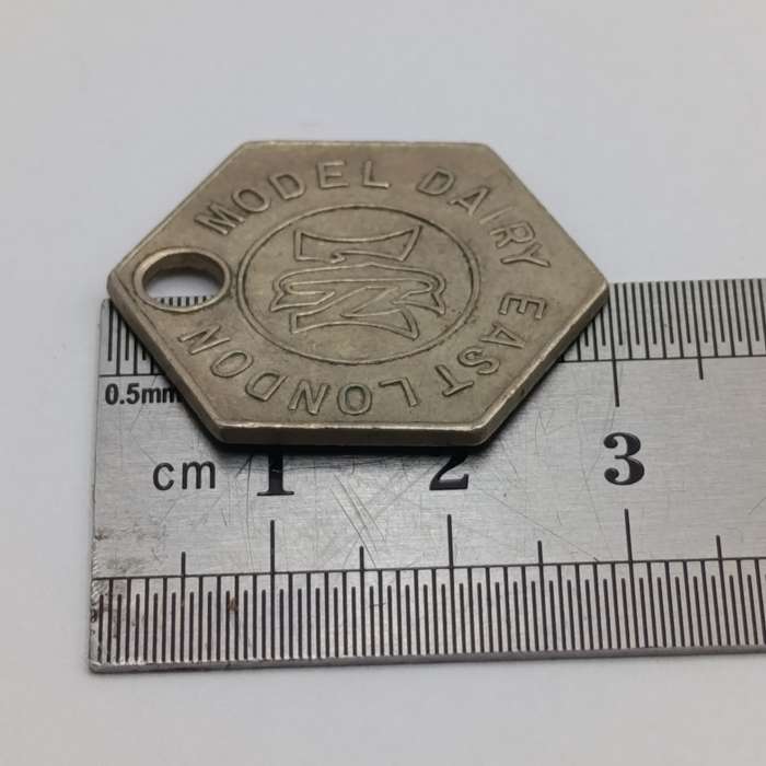 Model Dairy East London One pint hexagon milk token
