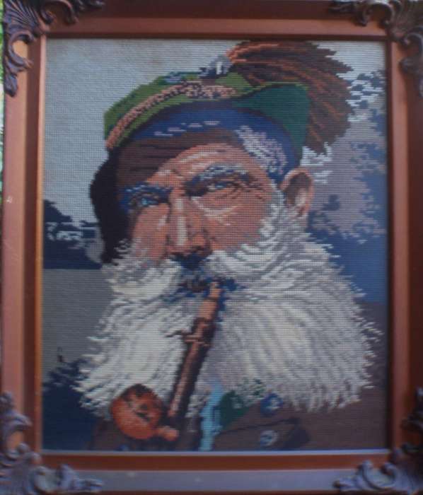 The best tapestry I have ever seen. Wonderful image of a bearded man in full regalia. Ornate frame