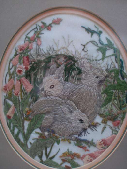 Exquisite embroidery in beautiful frame The Three Bunnies in a gorgeous garden. Stunning