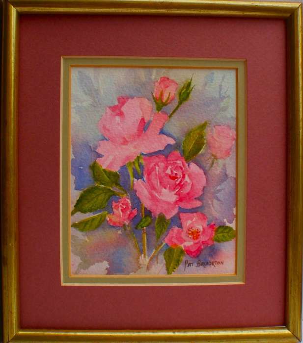 A beautiful pair of original watercolours by Pat Bruorton. Roses and Bourgainville. Well framed.