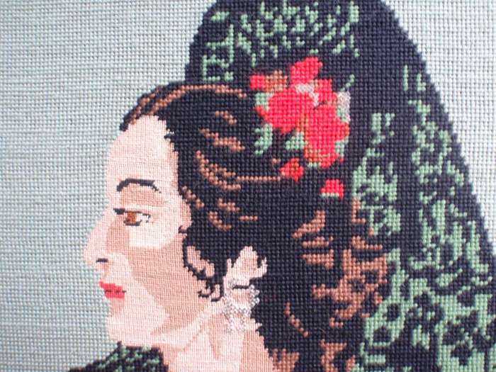 Beautiful tapestry of a Spanish lady.