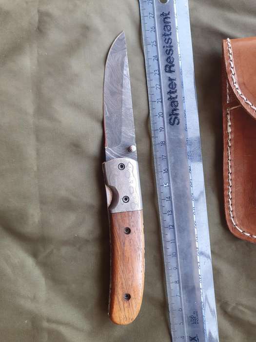 CK knives Damascus folder