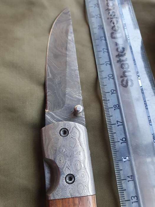CK knives Damascus folder
