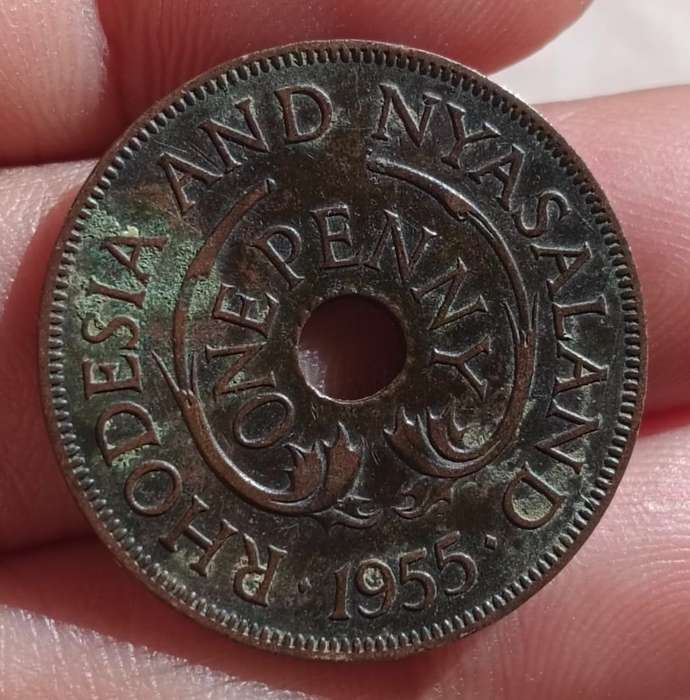 Rhodesia and Nyasaland Penny (1955) and Half Penny (1958) Bronze Coins with Distinctive Central Hole