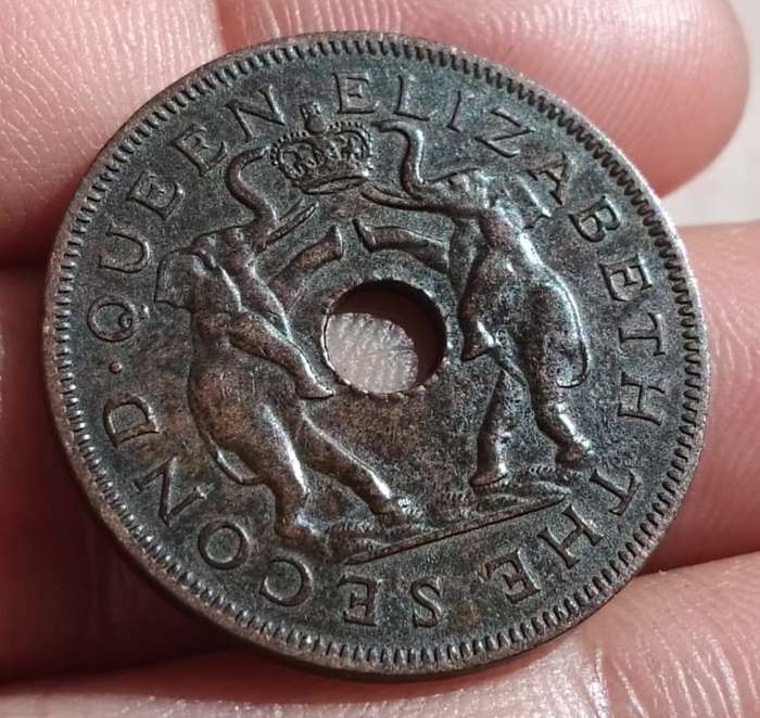 Rhodesia and Nyasaland Penny (1955) and Half Penny (1958) Bronze Coins with Distinctive Central Hole