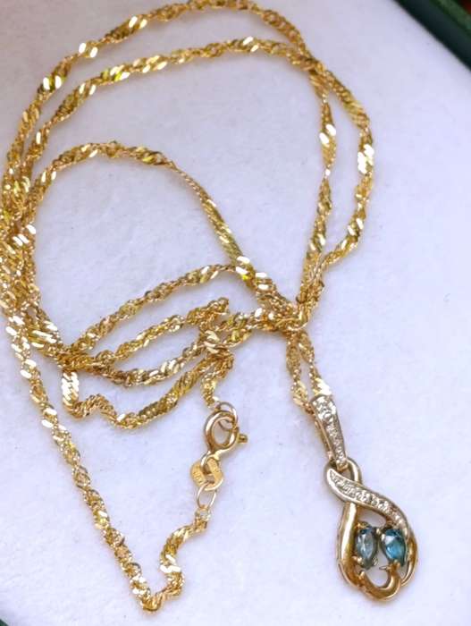 9ct Gold Blue Topaz Chain & Pendant Set