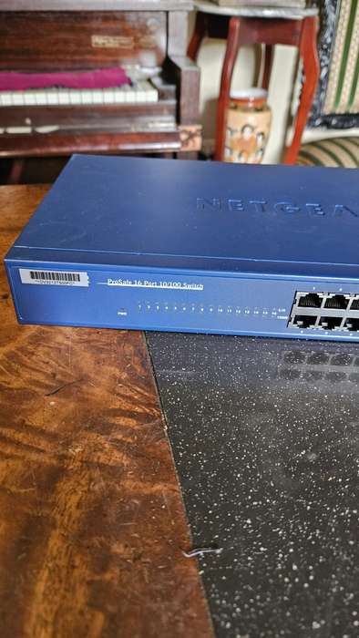 2 X NETGEAR Prosafe 16 Port 10/100 Switch. "Unused"