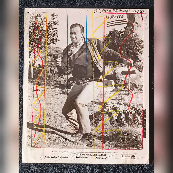 John Wayne jumbo photo used in the creative process of film poster making
