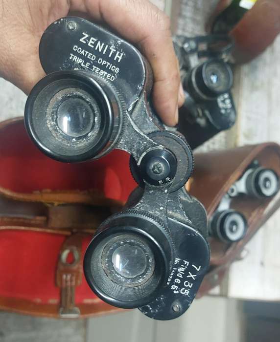 vintage binoculars bid for the lot
