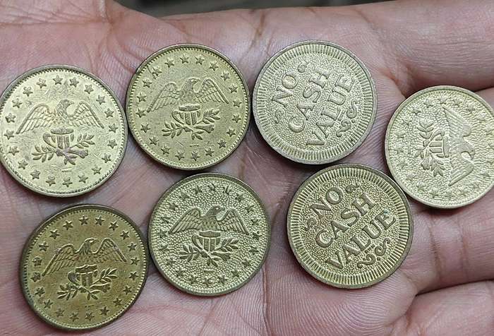 Rare vintage brass American  tokens 7 available bid per coin