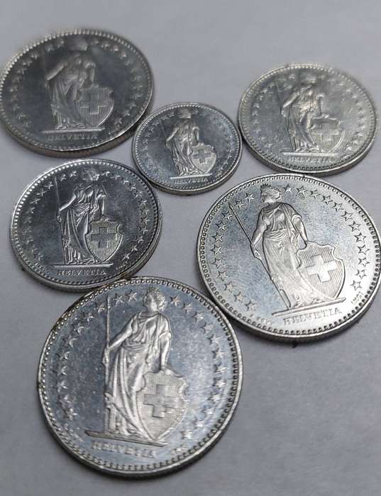 Vintage swiss francs coins totals 8 and a half francs